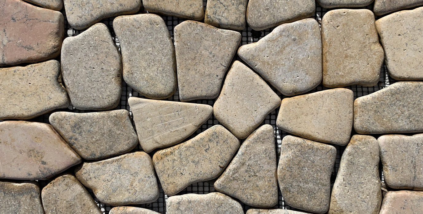 Natural stone mosaic for landscaping and pools in Rosso